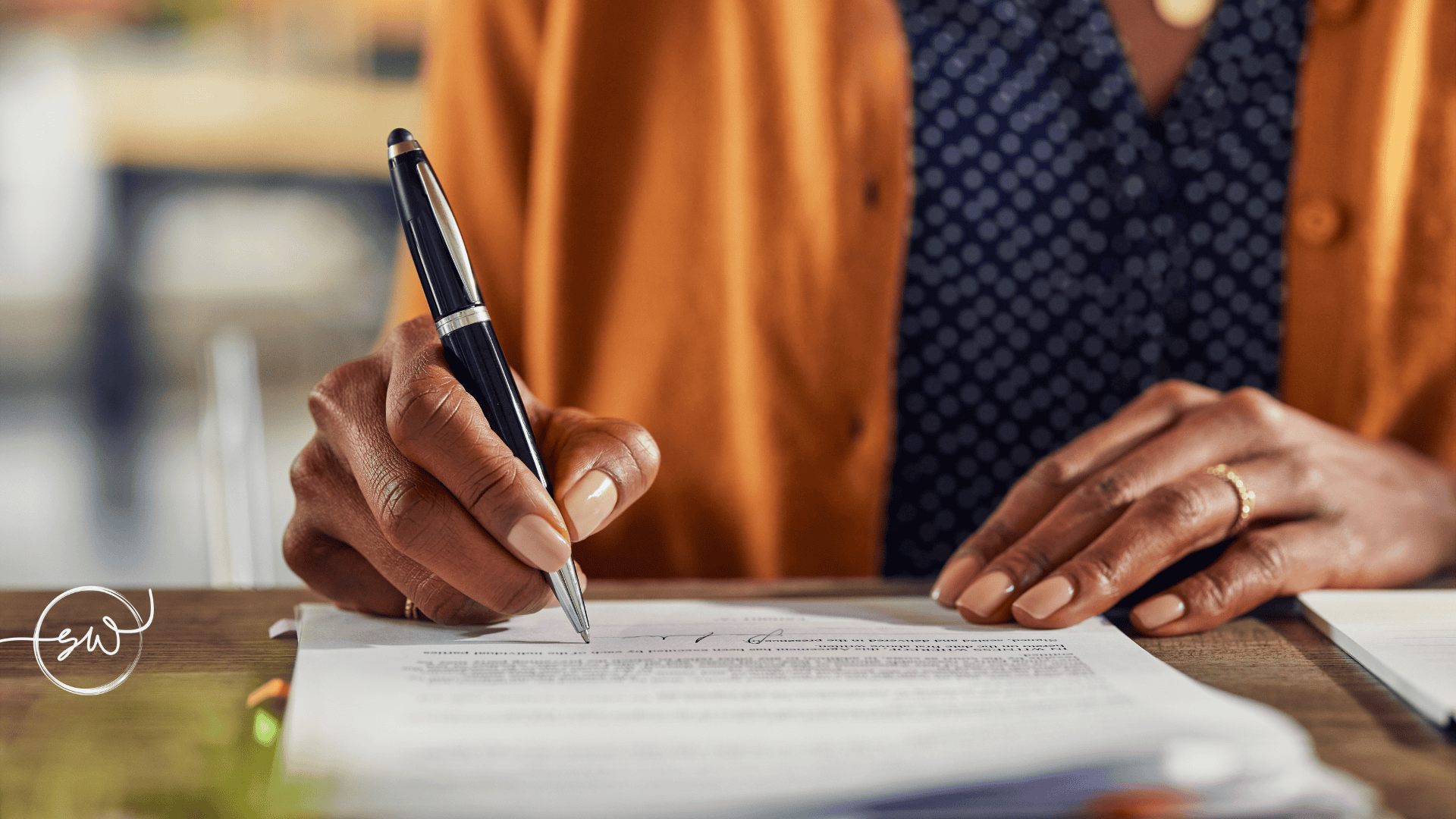 Executor signing estate and probate paperwork as part of their legal duties in NSW