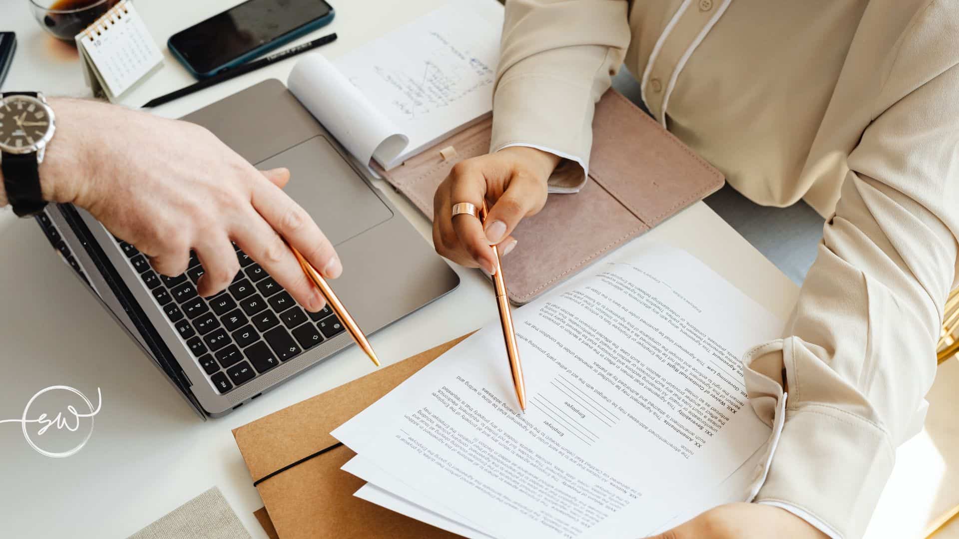 Do You Inherit Debt in Australia Two people reviewing deceased estate documents