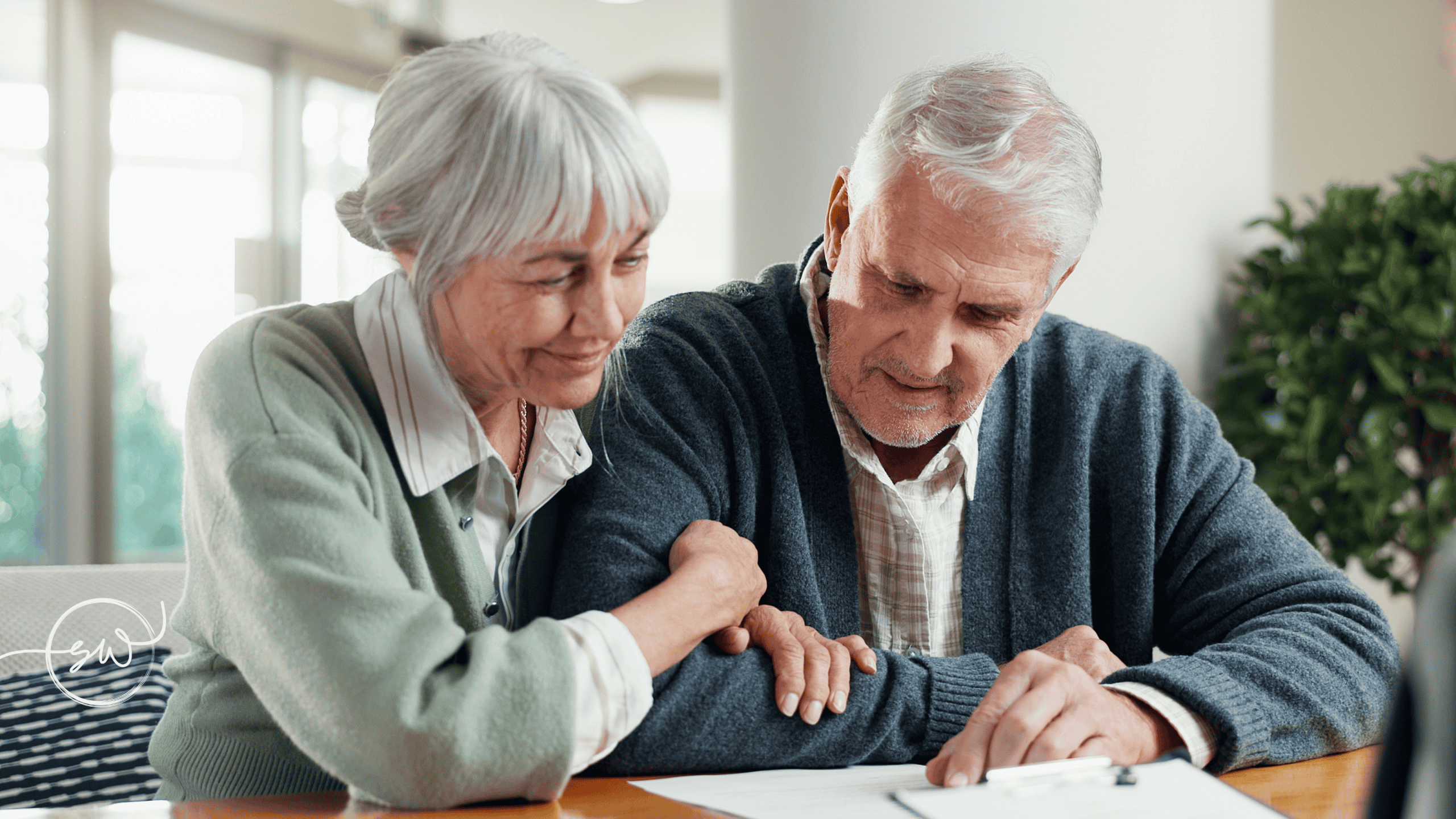 SMSF Succession Planning Couple reviewing SMSF succession and estate planning documents
