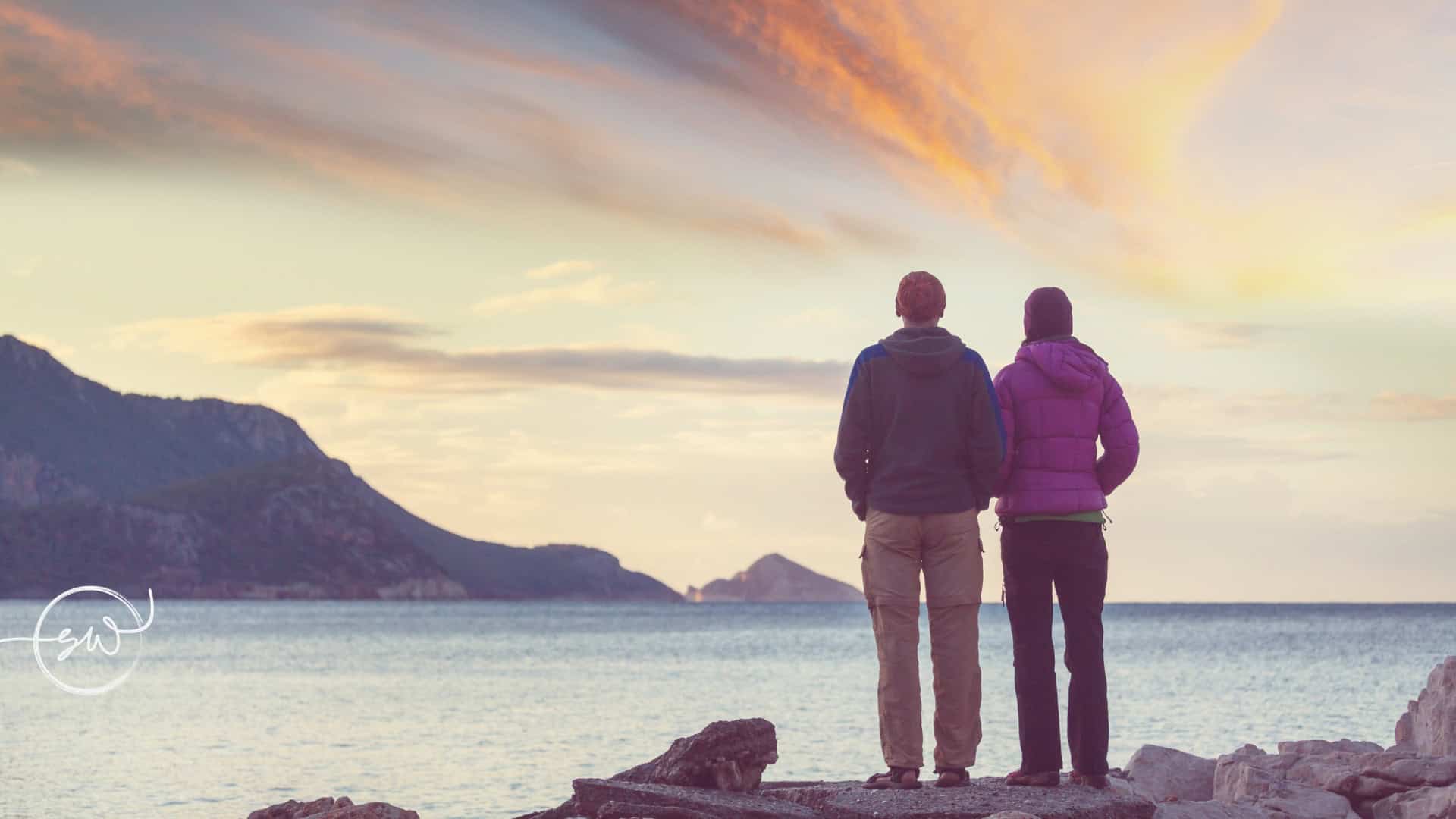 When Should You Update Your Will in NSW? Couple looking towards the horizon, representing major life changes and planning for the future