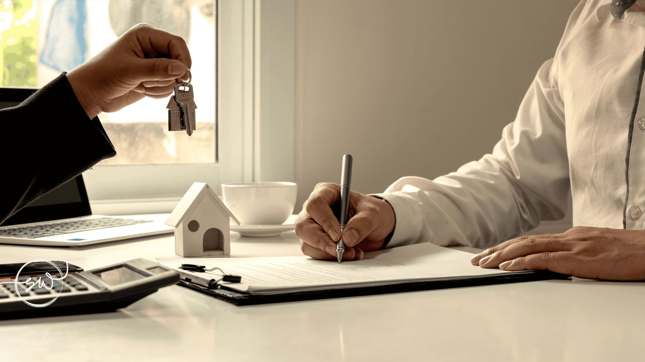 Property Contract NSW – What to Check Before Signing Person signing property documents while house keys are handed over